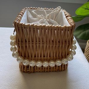 Straw & pearl handbag